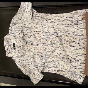 Gently worn Greg Norman Golf Shirt